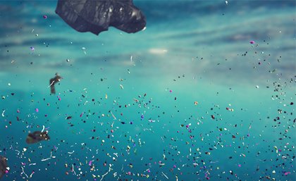 Image: Adobe Microplastics floating in water